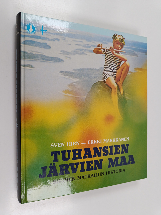 Sven Hirn ym. : Tuhansien järvien maa : Suomen matkailun ...