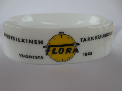 Tuhkakuppi Flora, Tarkkuuskello Sveitsiläinen