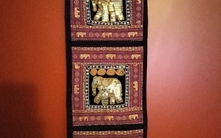 Thailand koriste-esine taskuilla