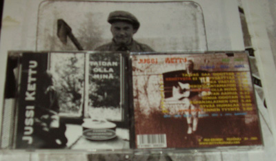 Jussi KETTU - TAIDAN OLLA MINÄ CD + RINTANAPPI