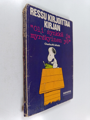 Charles M. Schulz : Ressu kirjoittaa kirjan "Oli synkkä j...