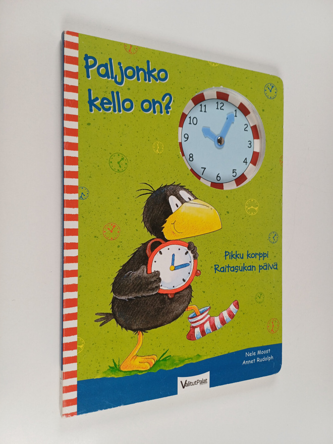 Nele Moost : Paljonko kello on? : pikku korppi Raitasukan...