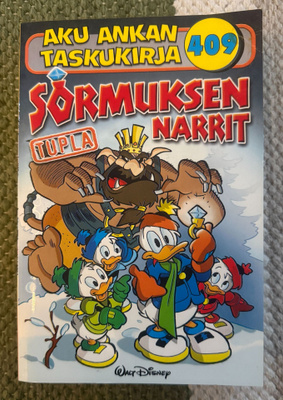AKU ANKAN TASKUKIRJA 409 - SORMUKSEN NARRIT (TUPLA)