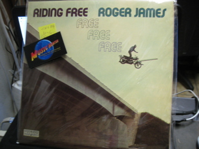 ROGER JAMES - RIDING FREE M-/M- LP