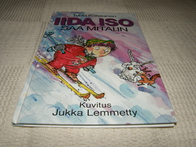 Tuula Korolainen Iida Iso saa mitalin
