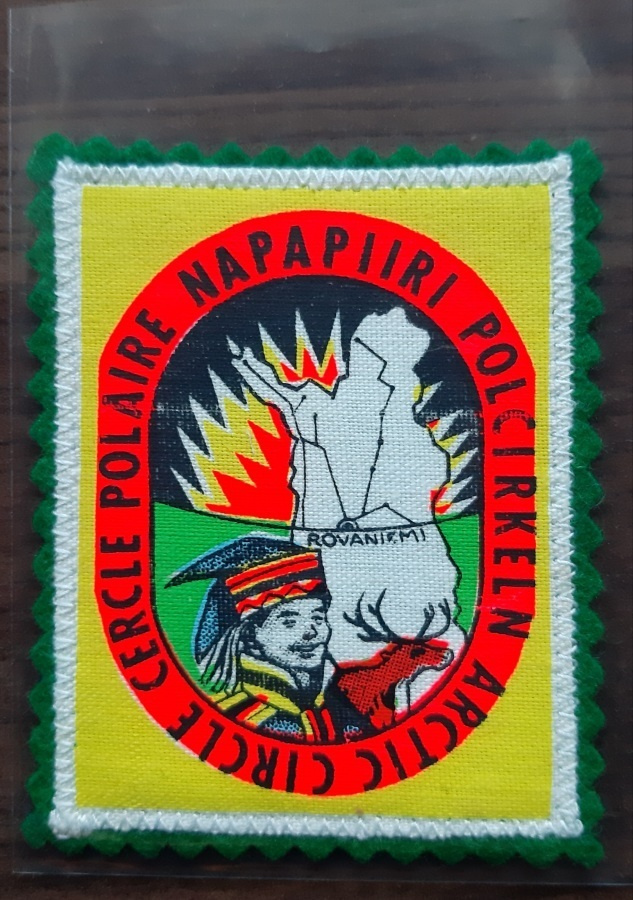 Napapiiri vintage kangasmerkki. vihreä huopa tausta