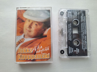 JUKKA KUOPPAMÄKI - AIKA NÄYTTÄÄ C-kasetti