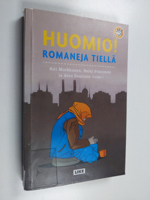 Aino Saarinen ym. : Huomio! : romaneja tiellä