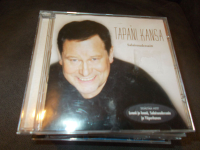 CD TAPANI KANSA ** SALAISUUDESSAIN **