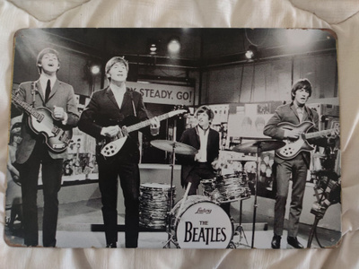 The Beatles peltikyltti