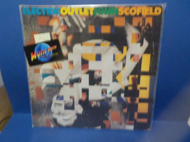 JOHN SCOFIELD - ELECTRIC OUTLET M-/EX+ SAKSA 1984 LP