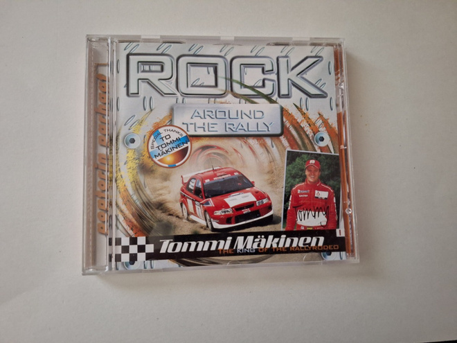 ROCK AROUND THE RALLY  ( TOMMI MÄKINEN ) . cd