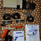 NES konsoli + 7 peliä + Zapper + Game Genie + koodivihko - pikkukuva 1