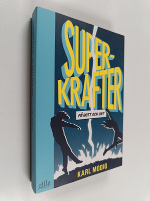 Karl Modig : Superkrafter : På gott och ont (signeerattu,...