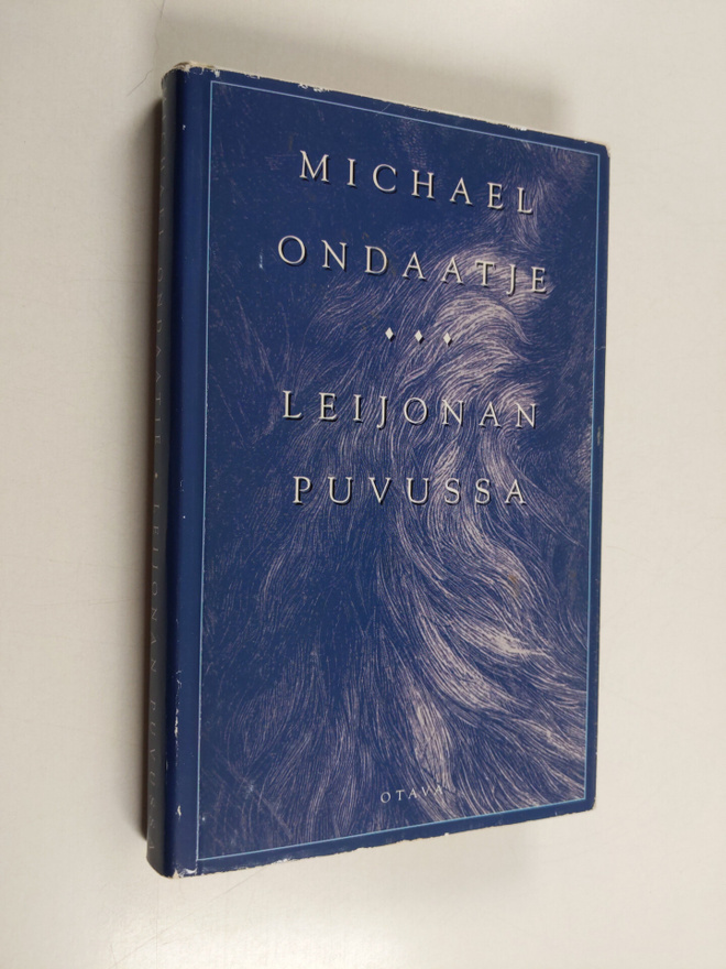 Michael Ondaatje : Leijonan puvussa
