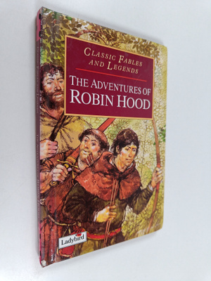 John Grant : The adventures of robin hood : robin the out...