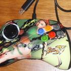 XBOX 360 Taistelupeli Street Fighter IV Mad Cats ohja. Cammy - pikkukuva 1
