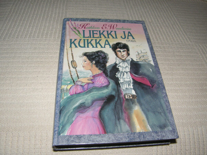 Kathleen E. Woodiwiss Liekki ja kukka