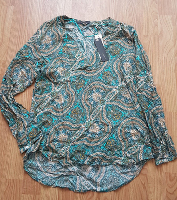 Uusi vaatepaketti koko XS