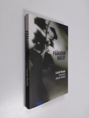 Laszlo Marton : Pääkadun varjot