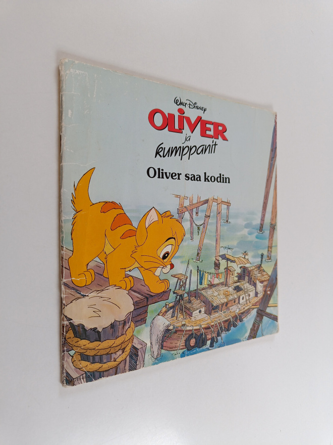 Walt Disney ym. : Oliver ja kumppanit : Oliver saa kodin