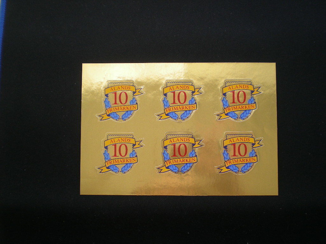 Ålands frimärken 10 år kultaiset kirjeensulkijat **