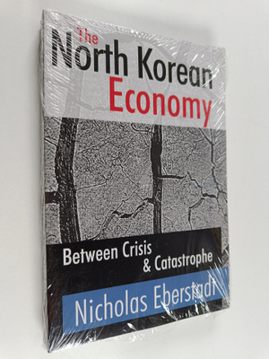 Nicholas Eberstadt ym. : The North Korean Economy : Betwe...