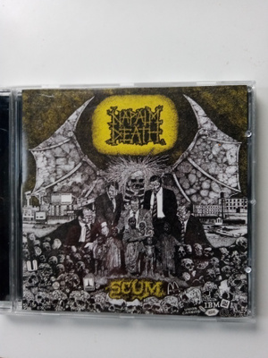 CD+DVD Napalm Death – Scum (DualDisc) Sis.postikulut