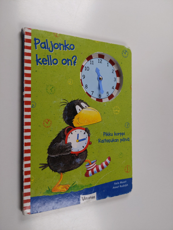 Nele Moost : Paljonko kello on? : pikku korppi Raitasukan...