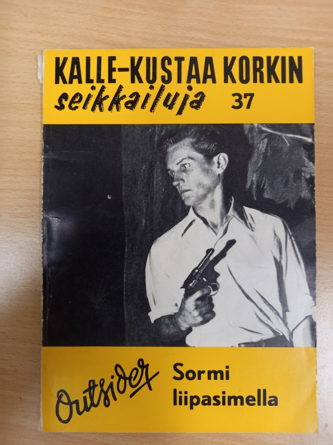 Kalle-Kustaa Korkki 37: Sormi liipasimella