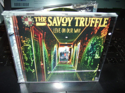 CD : The Savoy Truffle : Live on Our Way ( sis. postikulun )