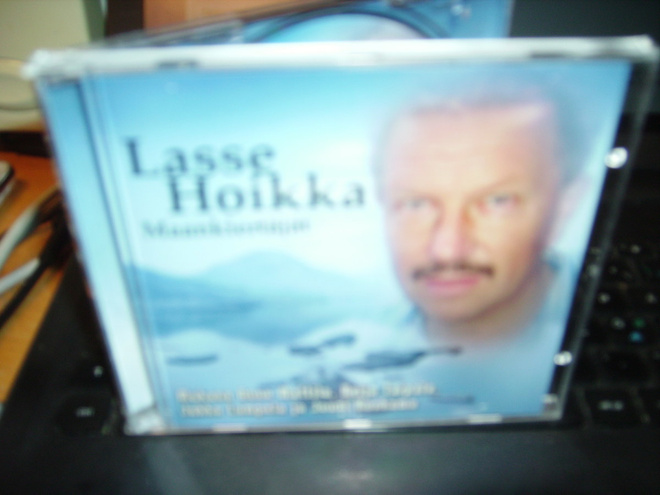 CD : Lasse Hoikka : Maankiertäjät ( sis. postikulun )