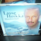 CD : Lasse Hoikka : Maankiertäjät ( sis. postikulun ) - pikkukuva 1