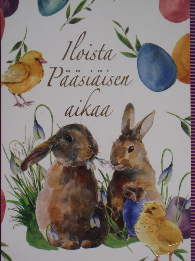 Pupulla lumikello suussa