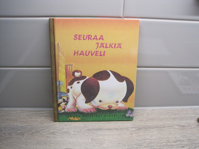 TAMMEN KULTAISET KIRJAT, SEURAA JÄLKIÄ HAUVELI, no 162