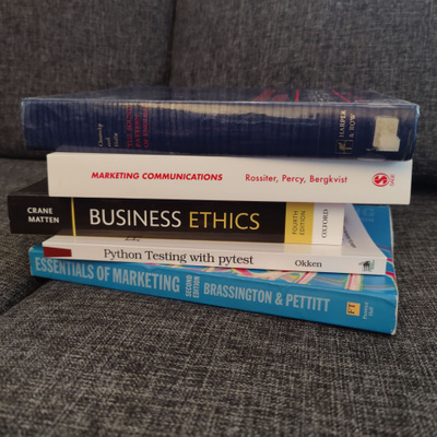 Books on marketing, business, language, and programming.