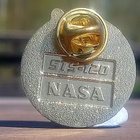 NASA merkki. Halkaisija - 26 mm. Leimalla STS 120 NASA. Ehjä - pikkukuva 4