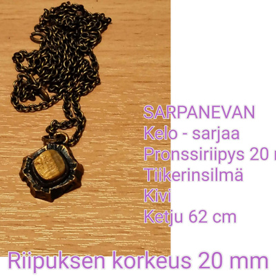 SARPANEVAN KELO -riipus, pronssi, kivi TIIKERINSILMÄ