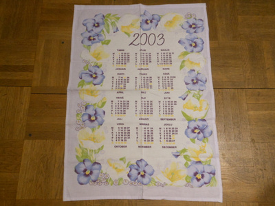 Kalenteripyyhe vuodelta 2003