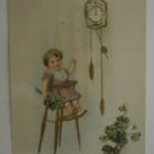 Lapsi, kello ja neliapiloita, Uuden Vuoden kortti, p. 1922 - pikkukuva 1