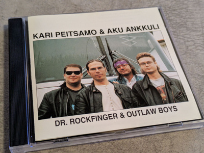 Kari Peitsamo & Aku Ankkuli - Dr. Rockfinger & Outlaw Boys