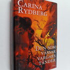 Carina Rydberg : Den som vässar vargars tänder roman - pikkukuva 1