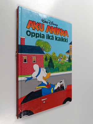 Walt Disney : Aku Ankka, oppia ikä kaikki : Disneyn satul...
