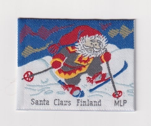 Joulupukki suksilla - kangasmerkki