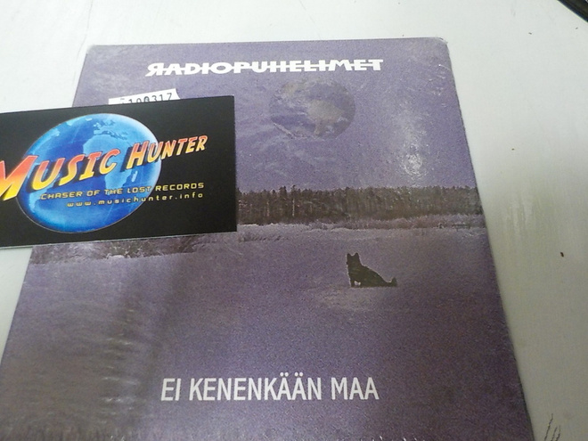 RADIOPUHELIMET - EI KENENKÄÄN MAA  CD UUSI!
