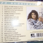 CD ANNELI SARI :  VALKOAKAASIAT ( SIS POSTIKULU  ) - pikkukuva 2