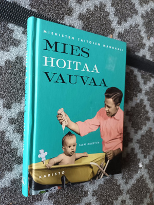 Mies hoitaa vauvaa. Miehisten taitojen manuaali