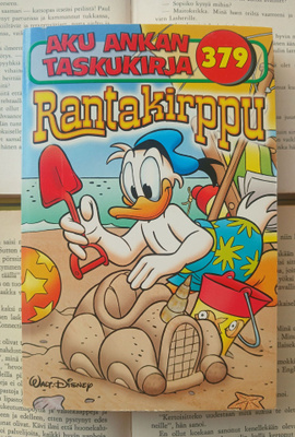 Aku Ankan taskukirja 379 • Rantakirppu