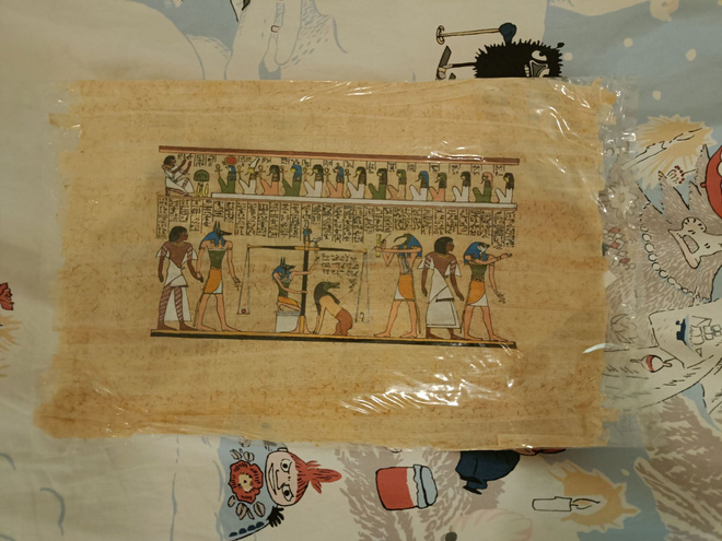 Egyptiläinen papyrus maalaus aitoustodistuksella