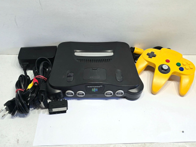 N64 konsoli + ohjain